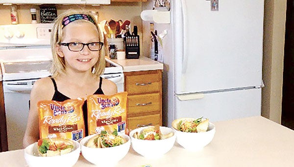 Emma Haugen, and the rest, of the Haugen family are taking part in the Uncle Ben’s Ben’s Beginners Cooking Contest. Photo provided.