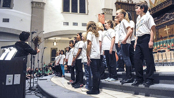 Southgate Elementary students sing during The Northwestern Singers presentation “Why We Sing,” Saturday night at St. Olaf Lutheran Church. It was the 15th annual benefit concert with proceeds given to performing youth music programs.