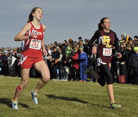 Madison Overby runs at the Class AA state cross country meet for the Packers in Northfield Saturday. -- Rocky Hulne/sports@austindailyherald.com