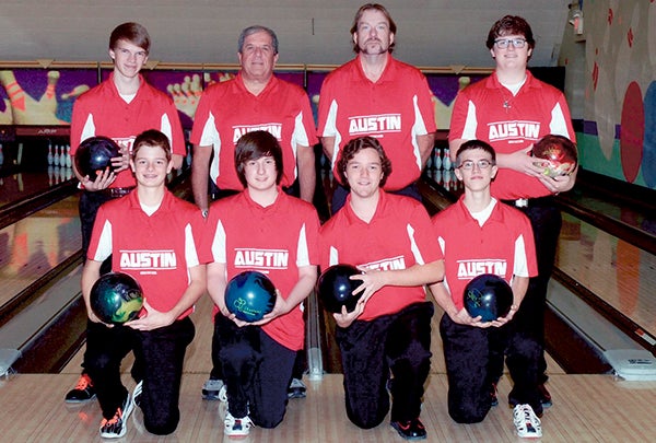 The Austin High School Bowling team placed first in the conference roll offs at Colonial Lanes in Rochester on Nov 1. This won them a berth in the State tournament on Dec. 6. Back row (left to right): Top Row: Joe Ulland, assistant coach Jim Juenger, head coach Ron Bearden and Matt Neumann. Bottom row: Tyler Bundy, Andrew Billat, Elijah Rayman and Tim Farrell. Not pictured: Ian Bearden. -- Photo Provided