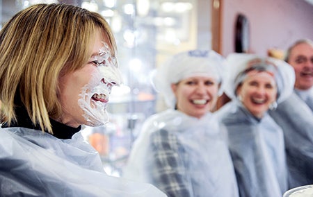 Sheri Dankert laughs after being hit in the face with a pie of whipped cream Nov. 20 at Mayo Clinic Health Systems — Austin.  Herald file photo
