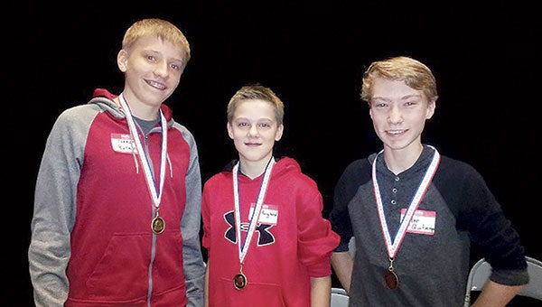 Ellis Middle School Geography Bee winners from left are: Connor Byram, Kyle Berglund and Tyler Quitmeyer.
