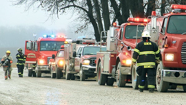 Geneva firefighters arrive on the scene of a hog barn fire at 85295 290th Street in rural Freeborn County Monday afternoon.  -- Photos by Jason Schoonover/jason.schoonover@austindailyherald.com