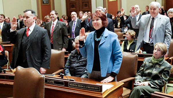 Rep. Jeanne Poppe, DFL-Austin, is sworn in for her sixth term in the Minnesota House in St. Paul Tuesday. Photo provided