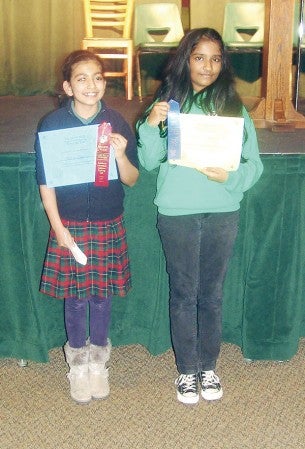 DeSilva and Nanda pose with their awards. Photos provided