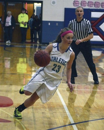 Lyle-Pacelli's Brooke Walter handles the ball in Adams Monday. -- Rocky Hulne/sports@austindailyherald.com