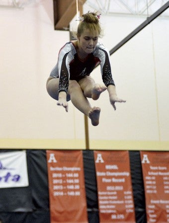 Maddie Mullenbach performs her floor routine for Austin Tuesday. -- Rocky Hulne/sports@austindailyherald.com