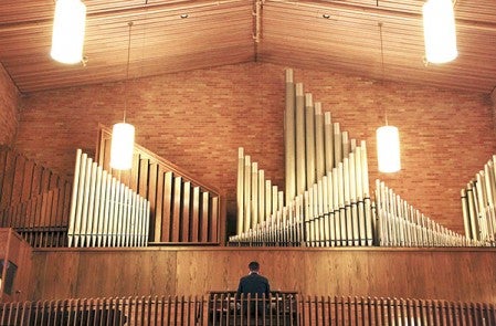 Andrew Galuska rehearses on the Our Saviors Lutheran Church organ. He will play the organ along with the 1925 silent film "The Phantom of the Opera" at the church at 4 p.m. on Feb. 8. Jason Schoonover/jason.schoonover@austindailyherald.com