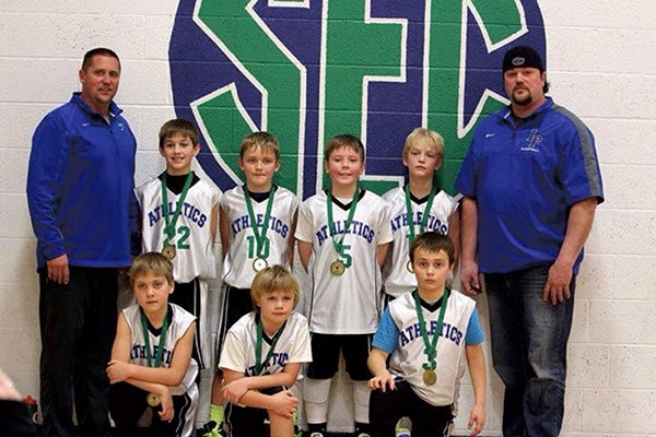 Lyle boys 5th grade basketball team took 2nd place in the Lyle Legacy tournament on Jan. 3 in Lyle. Back row (left to right): Coach Carl Truckenmiller, Mitchell Johnson, Jakob Truckenmiller, Mac Nelson, Hunter Bauer, and coach Ashley Bauer; front row: Jayden May, David Christianson and Tray Anderson. -- Photo Provided
