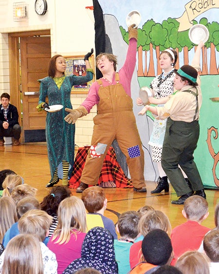 The cast for “Rabbit Tales” performs a song during the 45-minute play on Tuesday afternoon at Neveln. The entire school came to watch the performance which showcased Brer Rabbit finding out how to respect his friends. 