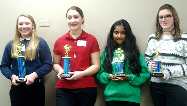 Seventh-grader Shenali DeSilva (middle right) finished third at the regional spelling bee Tuesday in Rochester. She will now move on to the final spelling bee on Feb. 24 at the Southeast Service Cooperative. -- Photo provided.