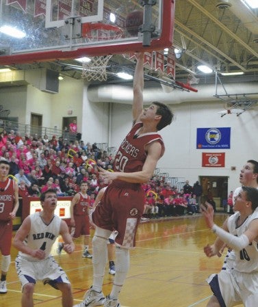 Zach Coffey goes up for a lay-up against Red Wing in Packer Gym Friday night. Rocky Hulne/sports@austindailyherald.com