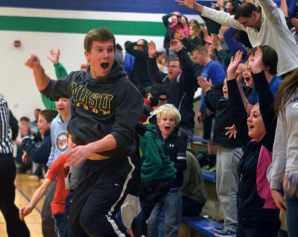The crowd reacts to Noah Jiskra's game-winning 3-pointer in Lyle Monday night. Rocky Hulne/sports@austindailyherald.com