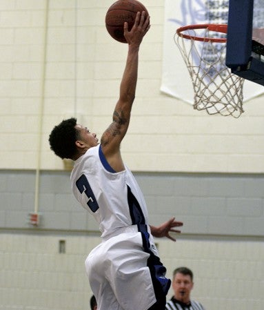 Marcus Myers goes up for a lay-up in Riverland Gym Wednesday. Rocky Hulne/sports@austindailyherald.com