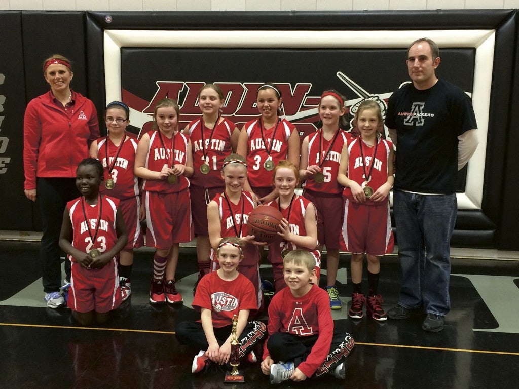 The Austin Youth Basketball 4th grade girls basketball team took first place at the Alden-Conger tournament this past recently. Back Row: Assistant Coach Nicole Shute, Liz Rutledge, Lilly VaDeer, Ali Portz, Isabella Weidemann, Kate Oleson, Carlie Retterath, and head Coach Brock VaDeer;  middle Row: Aluel Deng, Natalie Guanella and Cassidy Shute; front row: managers Marissa Shute and Hunter VaDeer. Photo Provided