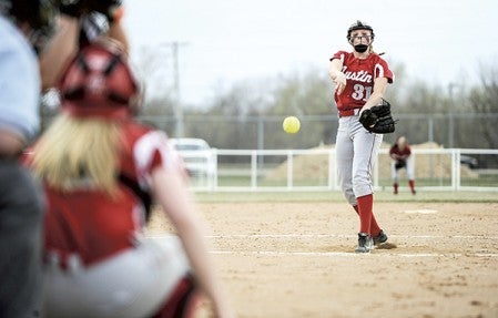 Austin's Jaidyn Bastian delivers in the second inning against Winona Thursday afternoon at Todd Park. Eric Johnson/photodesk@austindailyherald.com
