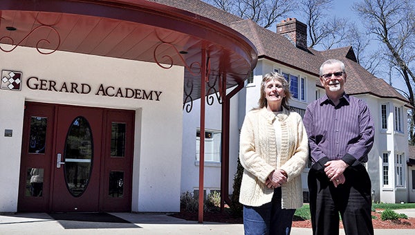 Executive Director of the Gerard Academy in Austin Brent Henry and Clinical Director Pam Retterath stand in front of the academy, which is now offering outpatient services. -- Jenae Hackensmith/ jenae.hackensmith @austindailyherald.com