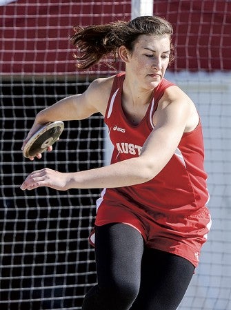 Austin's Amber Hansen heads into her spin during her first throw in the discus last season. Herald File Photo