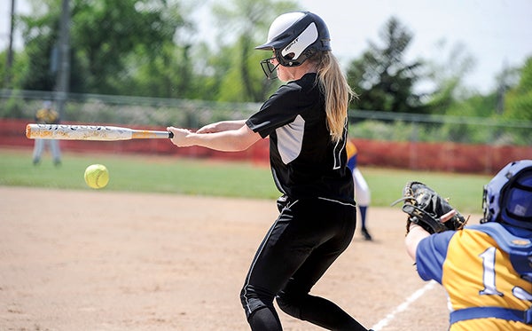 Blooming Prairie's Linnea Sunde slaps at a pitch during the Section 1A West Division championship game Friday against Hayfield at Todd Park. Eric Johnson/photodesk@austindailyherald.com