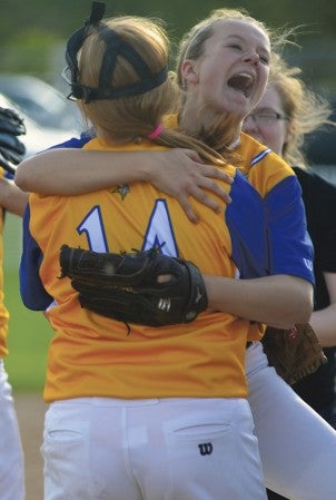 Hayfield's Alexis Dudycha and Kate Kruger share an embrace after the Vikings beat Fillmore Central 4-0 in Todd Park Thursday. Rocky Hulne/sports@austindailyherald.com