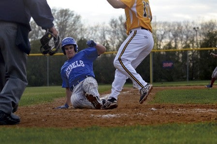 Southland's Lucas Mandt slides home against PEM in Adams Friday. Rocky Hulne/sports@austindailyherald.com