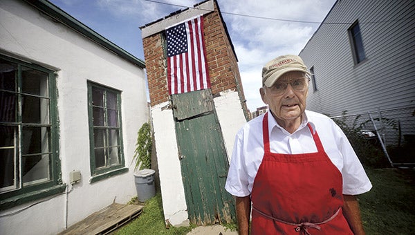 Robert Knauer, who passed away recently, was a mainstay and owner of the downtown landmark, Knauer’s Meat Market. Herald file photo