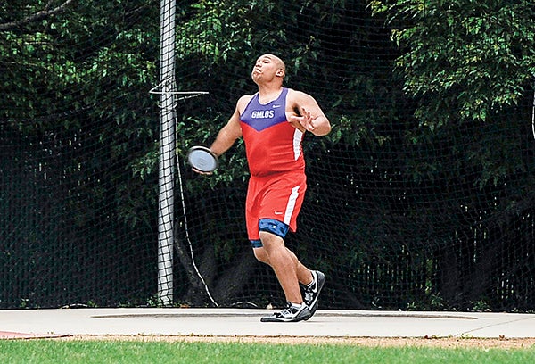 GMLOKS' Dom Bouska competes in finals of the discus Saturday at the Minnesota Class A State Track and Field Meet at Hamline University. Eric Johnson/photodesk@austindailyherald.com