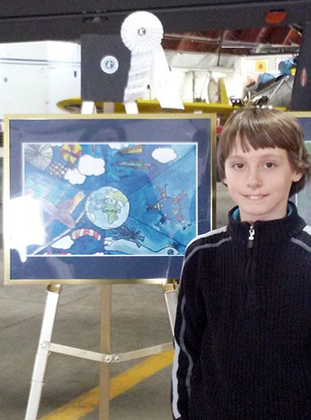 Wentworth with his award-winning drawing.  -- Photo provided