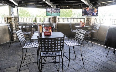 The open-air patio, new at Torge’s Live, offers both a fresh place to relax and have a drink as well as catch the ballgame. 