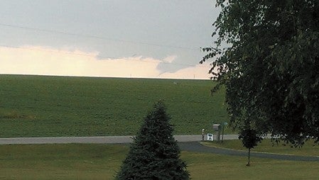 Gary Johnson took this photo of a funnel cloud that appears to touch down Sunday evening near his home on Ten Mile Lake, about 14 miles south of Fergus Falls. Photo provided
