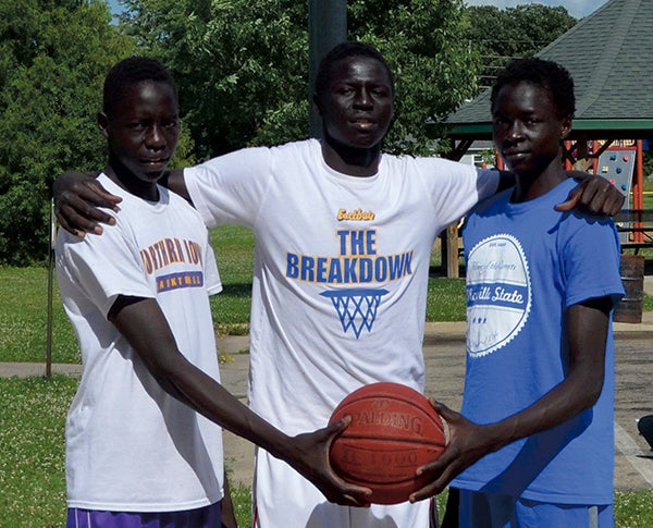 Duoth Gach and Both Gach have been active on the AAU basketball circuit this summer as they look to follow in their big brother Gach Gach's footsteps.  From left: Duoth, Gach and Both. Photo by Nathan Brinkman/For the Austin Daily Herald