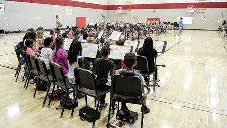 About 135 students taking part in the summer band camp come together to play what they learned for parents Thursday afternoon at I.J. Holton Intermediate School. Photos by Eric Johnson/photodesk@austindailyherald.com