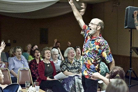 Austin native Bret Hesla leads the Community Sings benefit for Haiti at the Eagle’s Club in Minneapolis in October 2010.  Photo provided