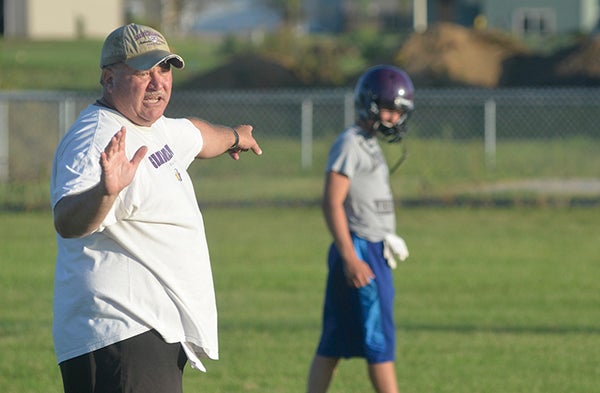Grand Meadow head football Gary Sloan directs practice in Grand Meadow Monday. Rocky Hulne/sports@austindailyherald.com