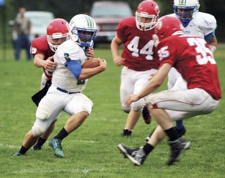 Lyle-Pacelli's Daniel Bollingberg carries the ball at Houston Friday. Photo Provided by Faye Bollingberg