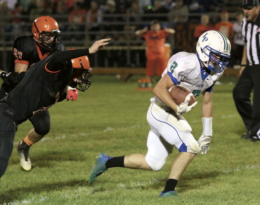 Lyle-Pacelli's Daniel Bollingberg breaks free for a touchdown in Lanesboro Friday. Photo Provided by Faye Bollingberg