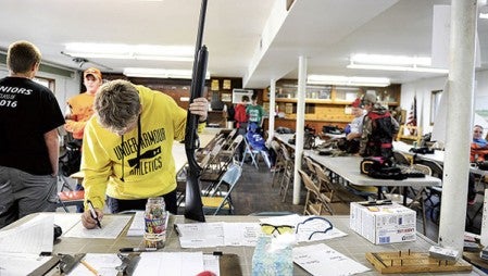 Austin trap team member Mitchell Cummings checks in for last Thursday’s competitive shoot at the Cedar Valley Conservation Club. Photos by Eric Johnson/photodesk@austindailyherald.com