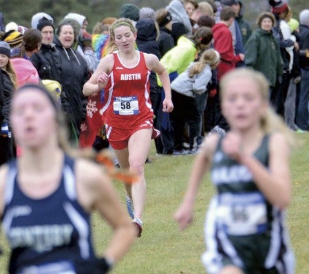 Austin's Madison Overby runs in the Section 1AA cross country meet in Owatonna Thursday. Overby earned her sixth straight trip to state at the meet. Jon Weisbrod/Owatonna People's Press
