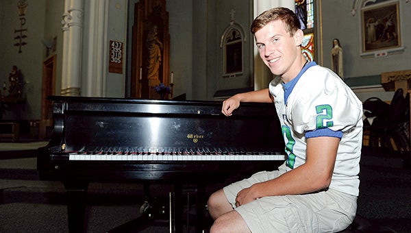 Pacelli student Daniel Bollingberg has been an athletic standout, but playing piano has also been a big part of his life. Eric Johnson/photodesk@austindailyherald.com