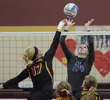 Grand Meadow's Rio Landers goes up for a block against Medford Thursday. Jon Weisbrod/Owatonna People's Press