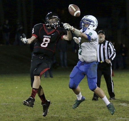 Lyle-Pacelli's Daniel Bollingberg breaks up a pass at Alden-Conger Thursday. Photo Provided by Faye Bollingberg