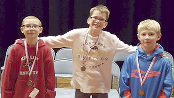 The fifth- and sixth-grade Geography Bee Winners at I.J. Holton Intermediate School include: Ray Wicks in third place; Camden Sweet in second place; and Wyatt Bunnell in first place.  Photo provided.