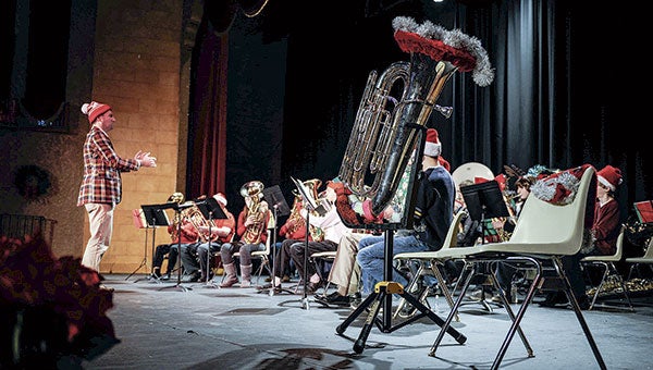 Val Pitzen’s tuba sits on stage in tribute to the founder of Austin’s Merry TubaChristmas during the sixth annual presentation of the show Saturday at The Paramount Theatre. Photos by Eric Johnson/photodesk@austindailyherald.com