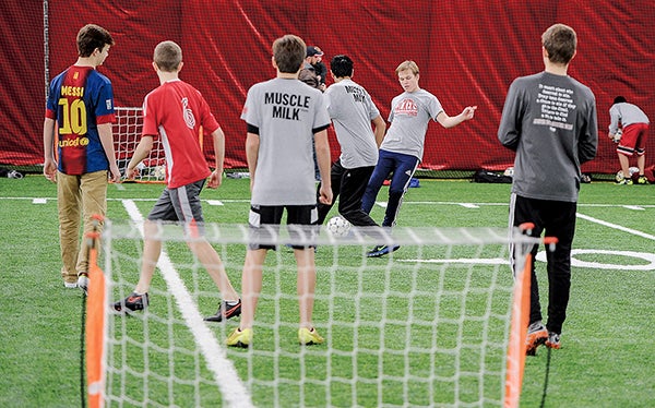 A pick-up game of soccer was one of the many activities taking place Saturday morning during an open house for the structure to showcase was is possible under the dome. Eric Johnson/photodesk@austindailyherald.com