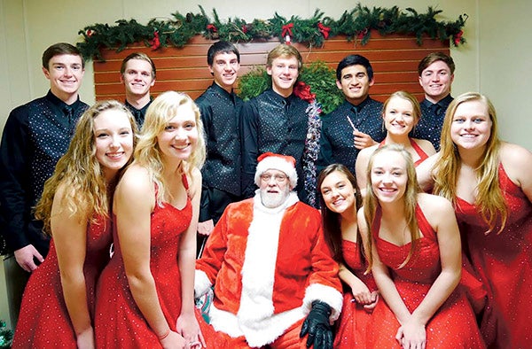 The Austinaires and Santa Claus celebrated Christmas in the East at the Mower County Humane Society. Photo provided