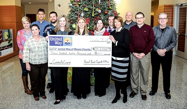 Employees for Hormel donated $312,000 to the United Way Friday afternoon at Hormel corporate. The check was presented to Diane Baker, executive director of the Mower County United Way. Eric Johnson/photodesk@austindailyherald.com