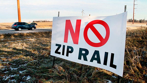 A sign expressing opposition to a proposed high-speed rail line between the Twin Cities and Rochester is seen along Highway 52 in Goodhue County. Alex Kolyer for MPR News