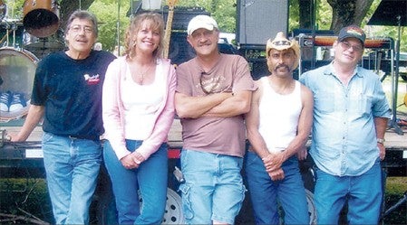 Eddie Miller (far left) the Blue Denim Band that include his wife Lori Lynn Miller. 