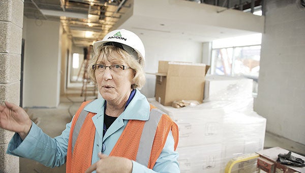 I.J. Holton Intermediate School principal Jean McDermott shows off the office area during a tour for media in May of 2013. The school opened that following fall. Herald file photo