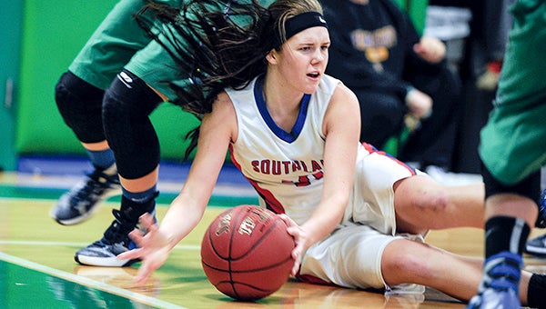 Southland’s Kaysie Allen scrambles for a loose ball in the first half against Lyle-Pacelli Saturday afternoon at Pacelli. -- Photos by Eric Johnson/photodesk@austindailyherald.com